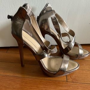 BCBG Max Azria gold stilettos with zipper heel
